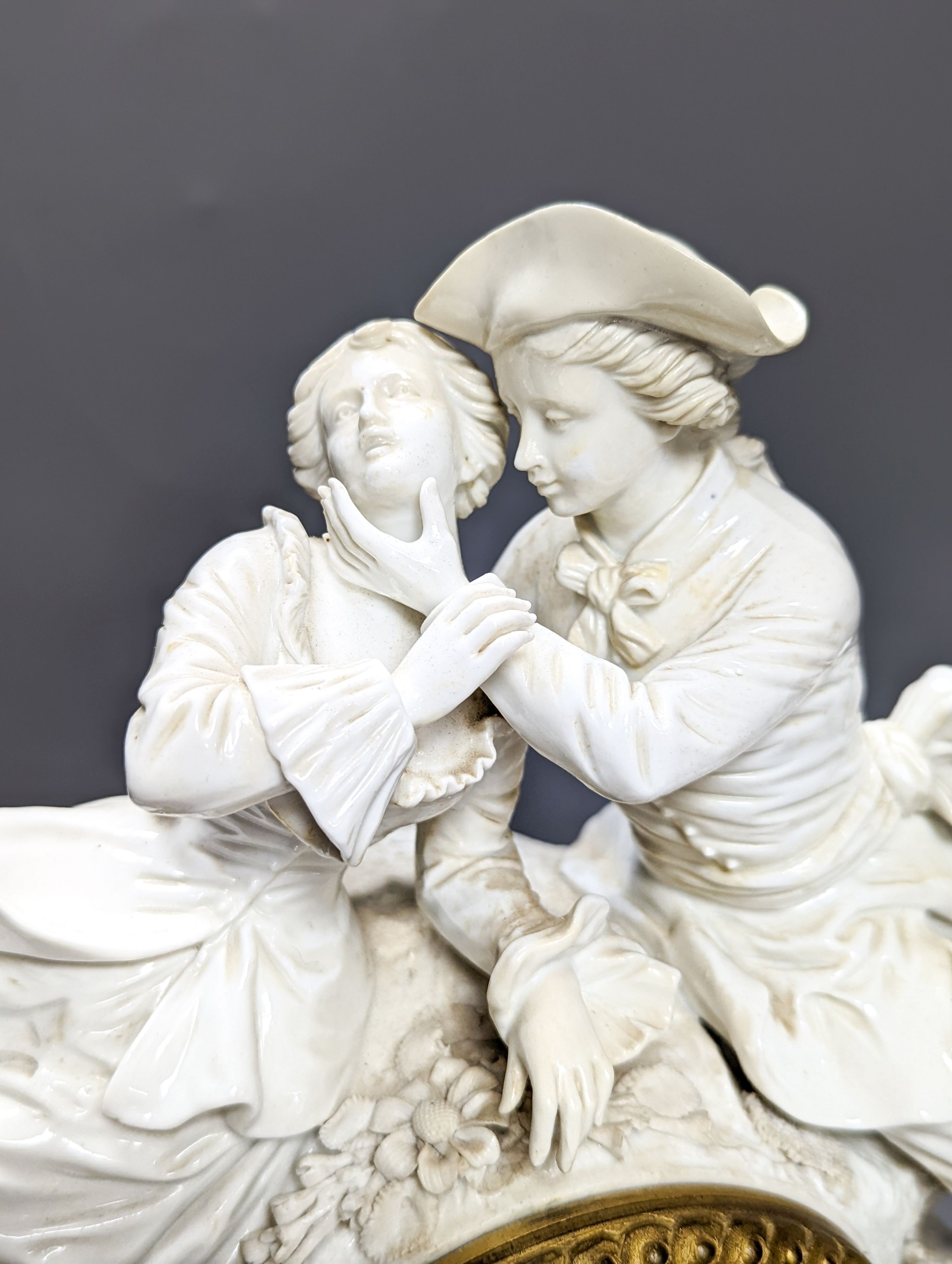 A late 19th century ormolu mounted Naples white porcelain mantel clock, width 30cm height 32.5cm